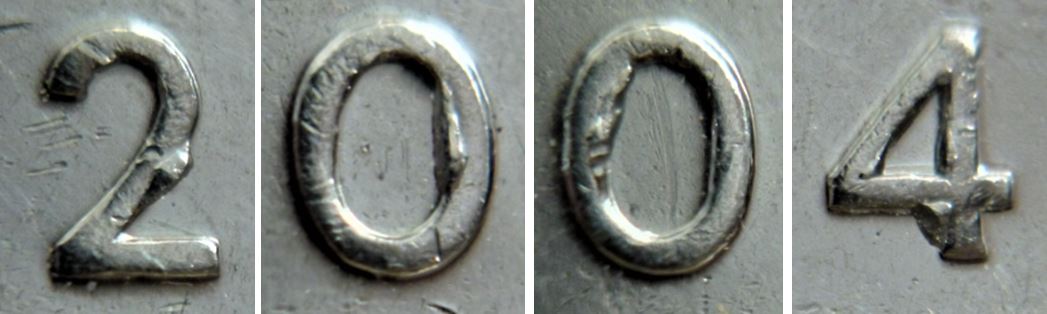 5 Cents 2004 -Éclat coin sur 2004 et la tige feuille gauche-2.JPG