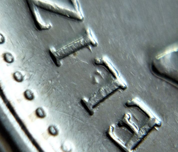 5 Cents 2011-Dommage du coin ELI de ELIzabeth,3.JPG