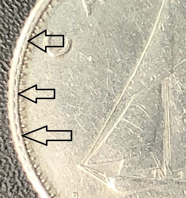 10 cents 1968 entrechoque près avec flèches.jpg