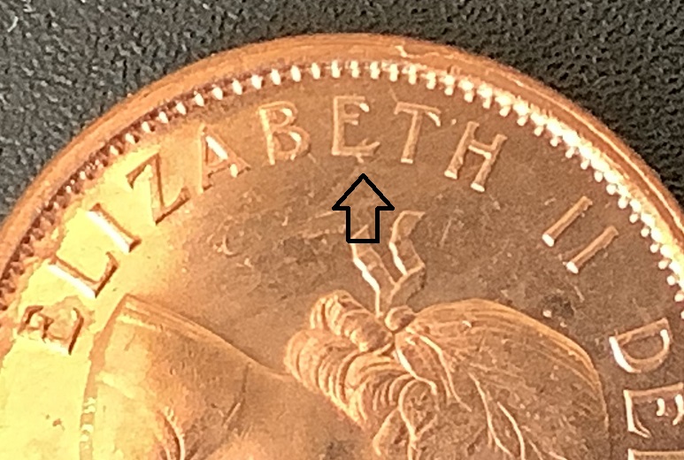 1 cent 1962 demi-lune avers détails 2 avec flèche.jpg