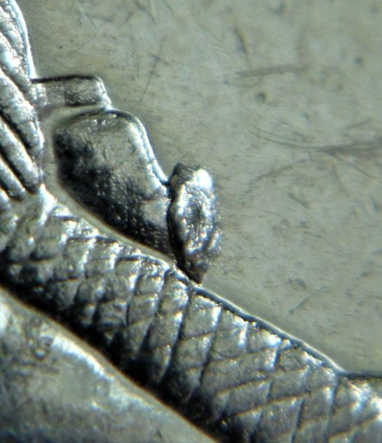 5 Cents 2009-Éclat coin au bout de la buche,3.JPG