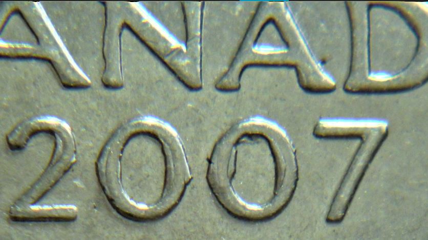 5 Cents 2007-Frappe a travers au dessus A+Accumulation sur la date et lettres-3.JPG