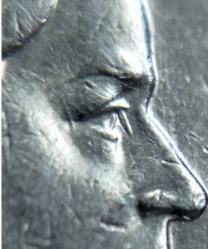 10 Cents 1991-Dommage du coin devant et en arrière de l'oeuil de effigie-3.JPG