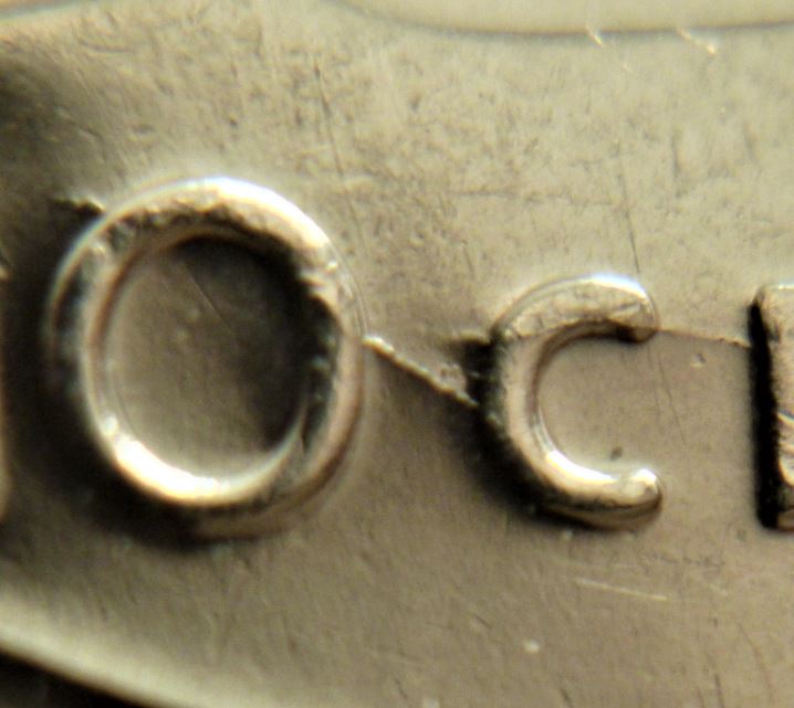 10 Cents 2003-Coin fendillé sur OCE de 1O CEnts-2.JPG