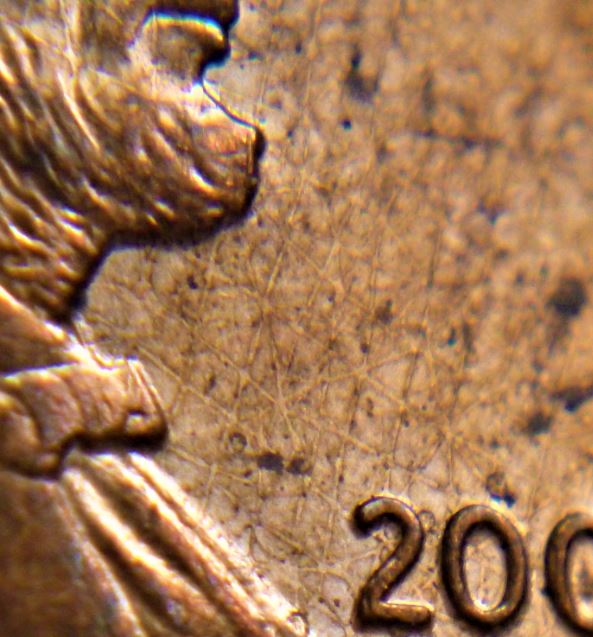 1 Cent 2008-USA-Coté avers le flan  est carrelé-placage déficient-4.JPG