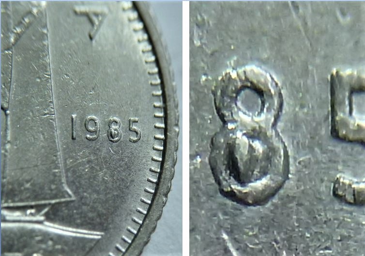 10 Cents 1985-Le 8 a le trou du bas bouché -Éclat du coin-1.JPG