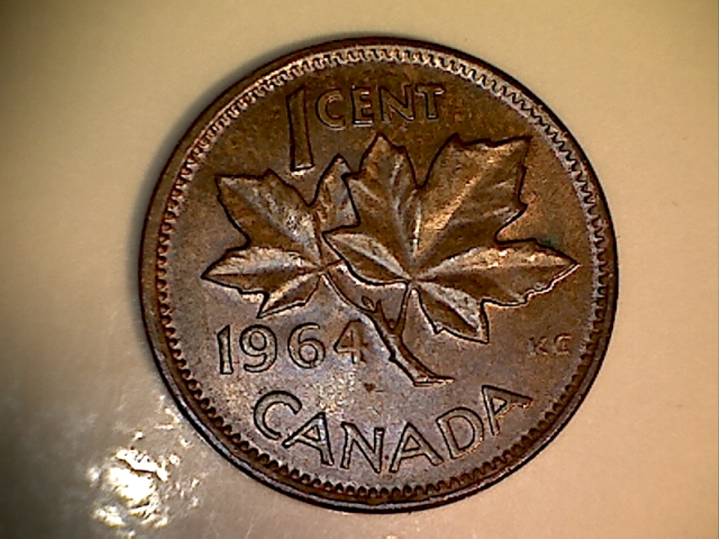 1964 Coin obturé au revers 12 à 15 hr. JD639 Revers.jpg