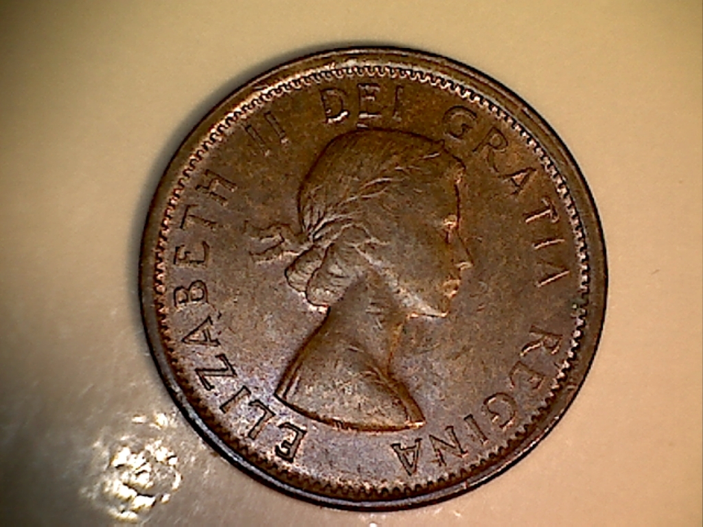 1964 Coin obturé au revers 12 à 15 hr. JD639 Avers.jpg