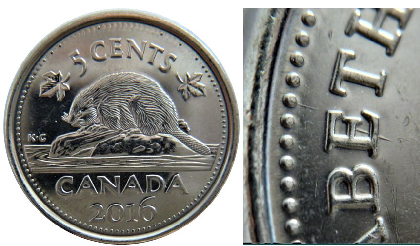5 Cents 2016-Dommage du coin a travers E de elizabEth-1.JPG