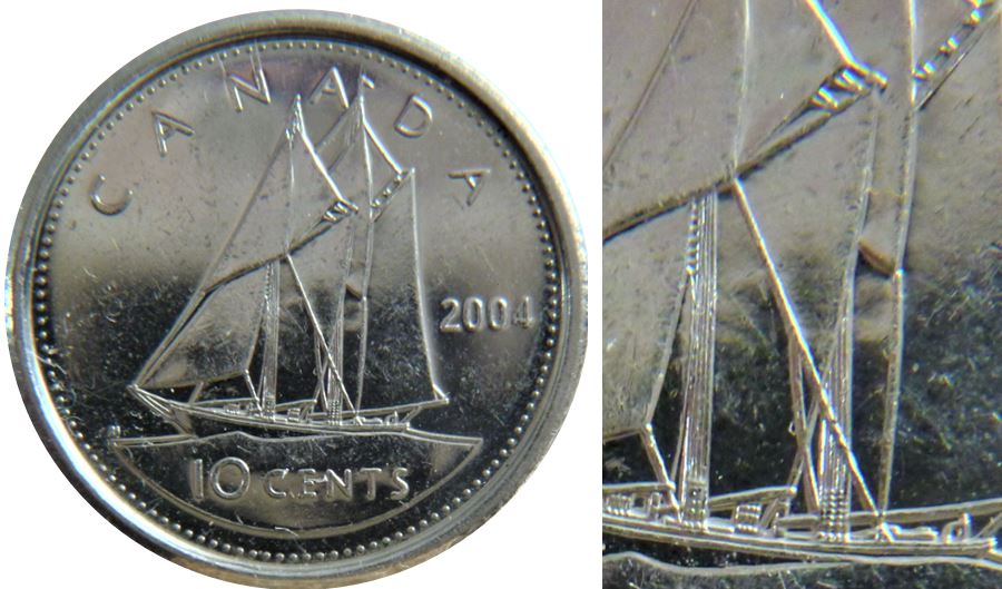 10 Cents 2004-Éclat coin sous menton+Entrechoqué sur le voilier-2.JPG