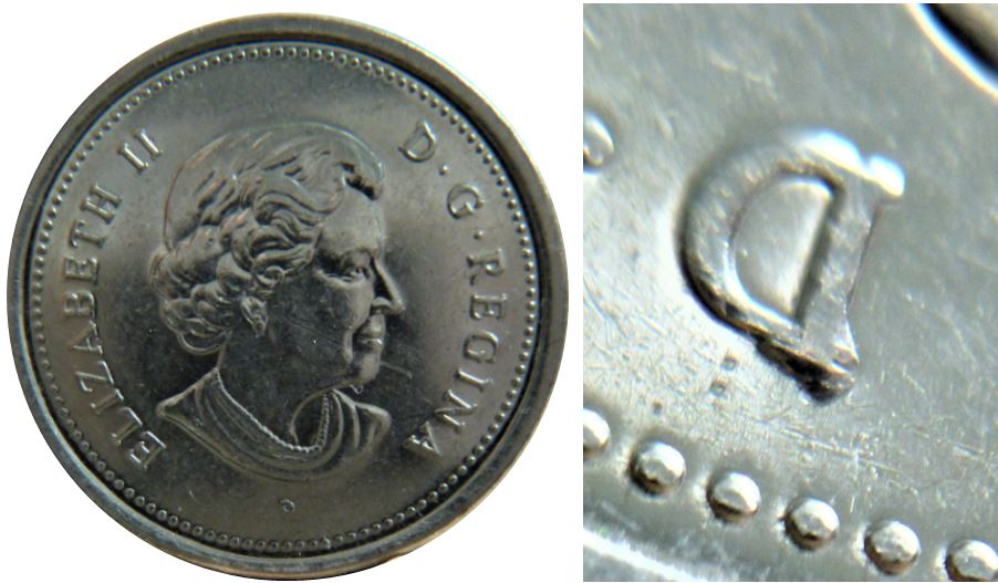 25 Cents 2005-Éclat coin sur D de D.g.-2.JPG