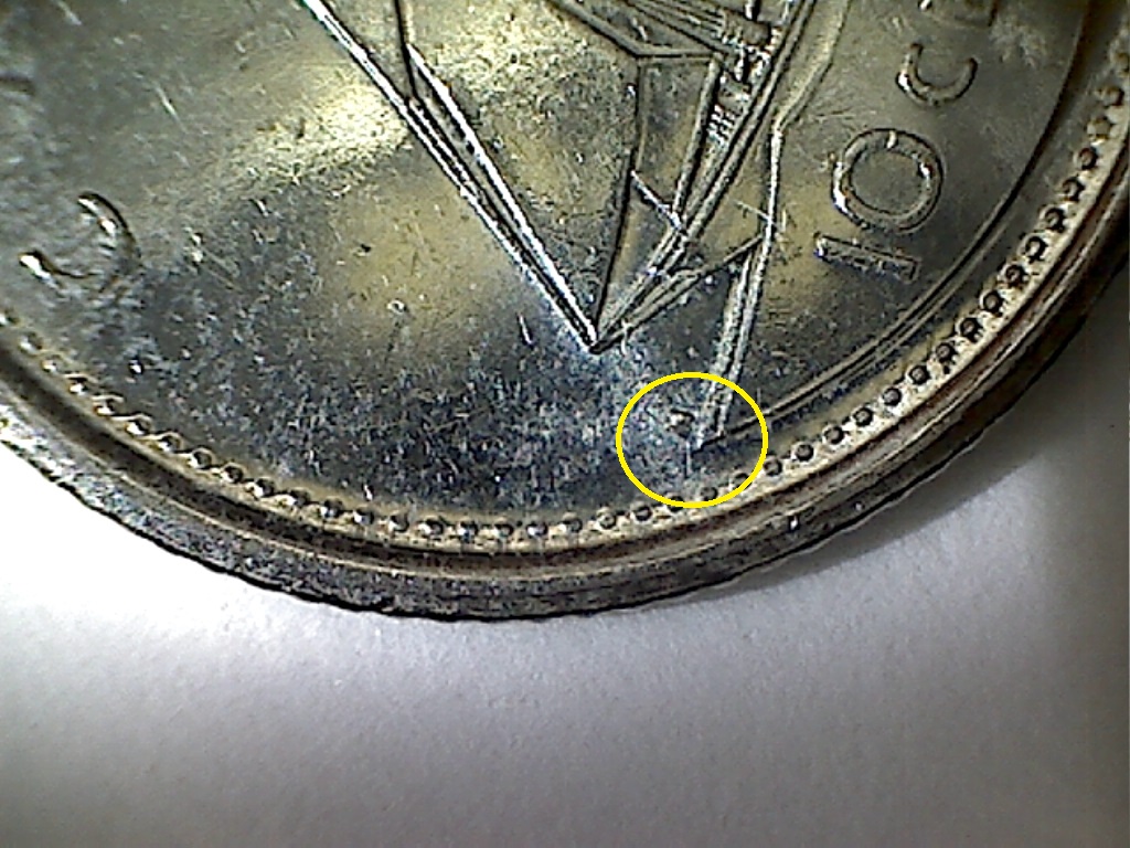 2011 Éclat de coin sur H B122033C.jpg