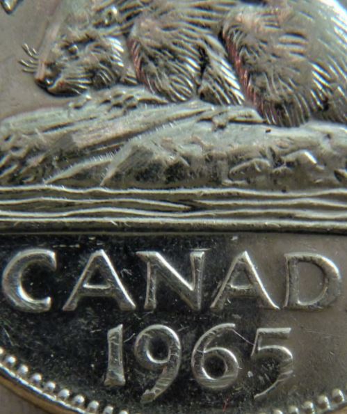 5 Cents 1965- Polissage excessif au tour de buche-1.JPG