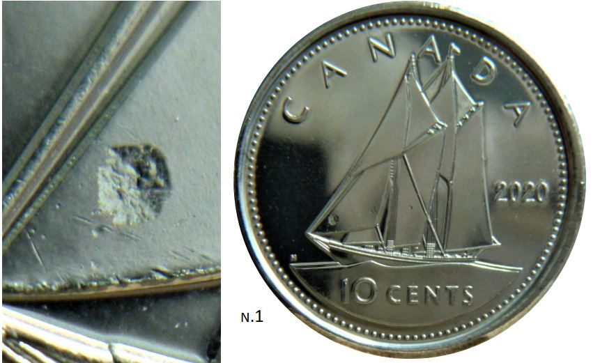 10 Cents 2020-Frappe à travers dans le bas de la première voile-1.JPG