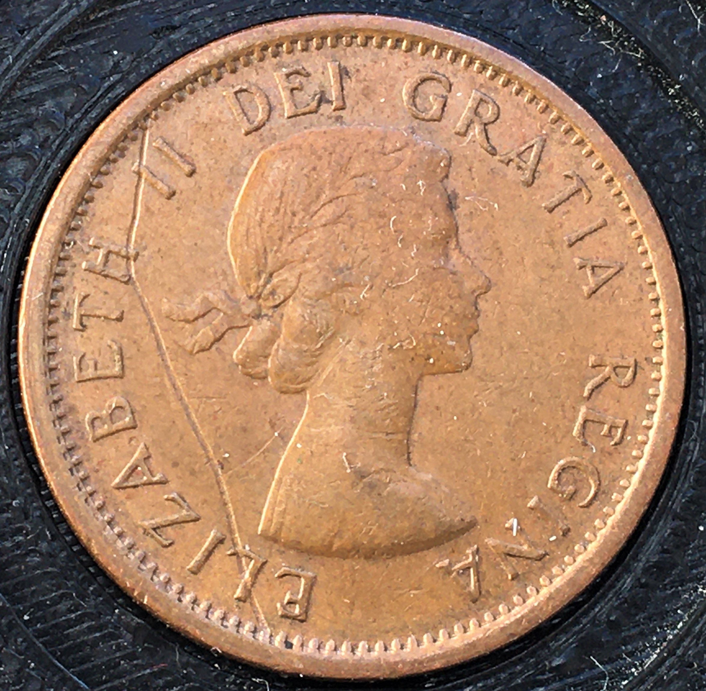 1 cent 1963 frappe à travers.jpg