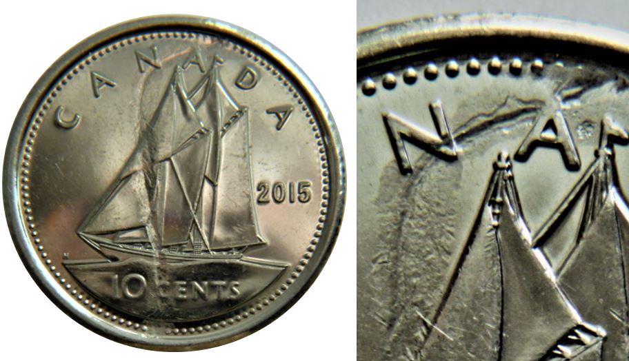 10 Cents 2015-Frappe à travers sur le revers-de haut en bas-2.JPG