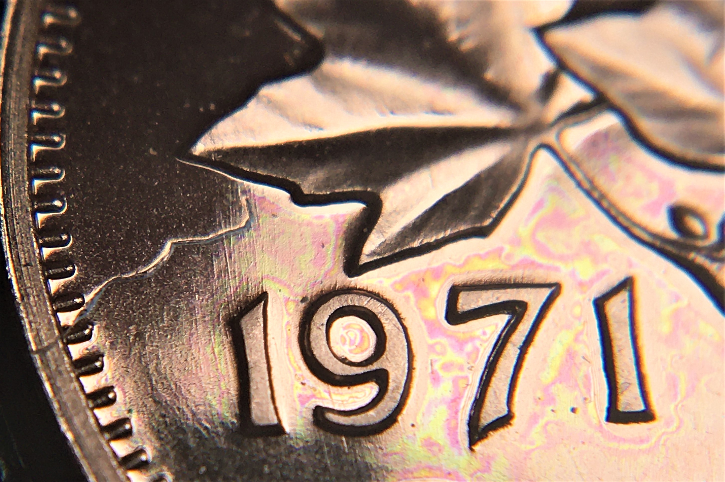1 cent 1971 frappe à travers et double 7.jpg