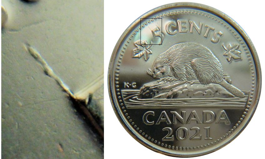 5 Cents 2021-Coin fendillé au dessus du 5-1.JPG