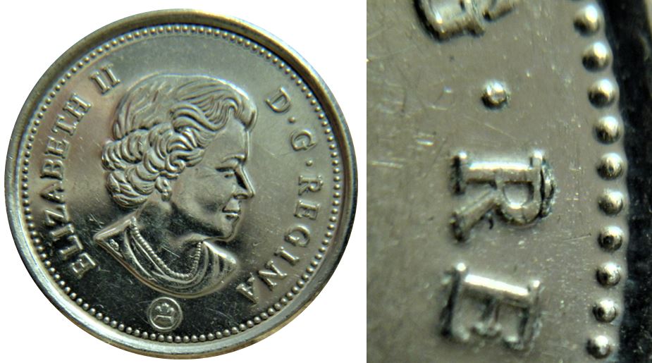 10 Cents 2015-Éclat coin sur R de Regina-2.,.JPG