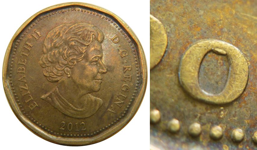 1 Dollar 2012-Éclat coin dans O de dOllar-No.1,.JPG