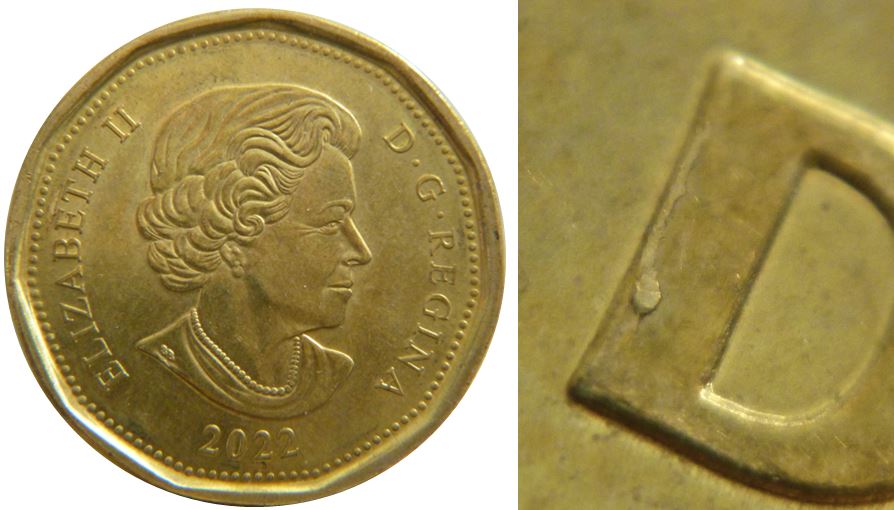 1 Dollar 2022-Éclat coin sur D de Dollar-1.JPG