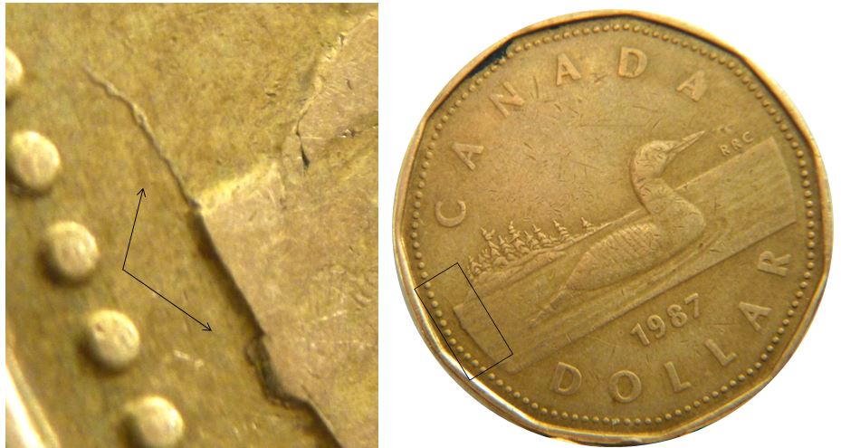 1 Dollar 1987-Éclat du coin plus coin fendillé revers-2.JPG