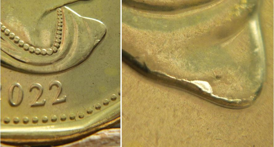 1 Dollar 2022-Éclat coin à la base coin fendillé de chaque coté de l'éclat-1.JPG