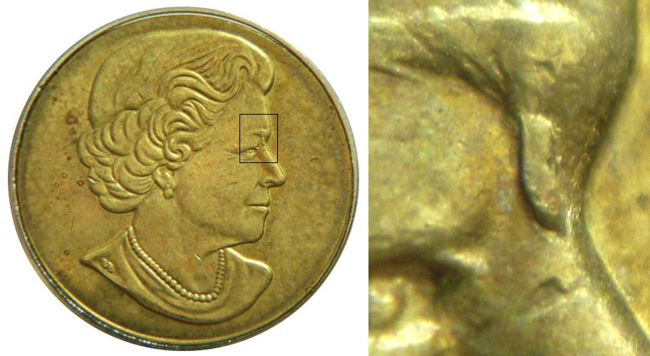 2 Dollars 2022-Éclat coin sous la sourcil-1.JPG