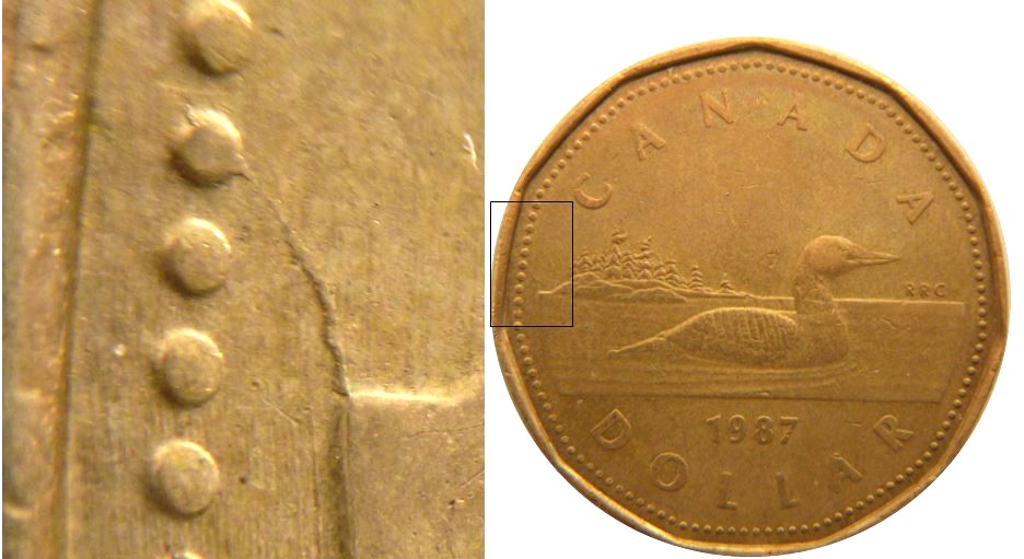 1 Dollar 1987-Coin fendillé revers-1.JPG