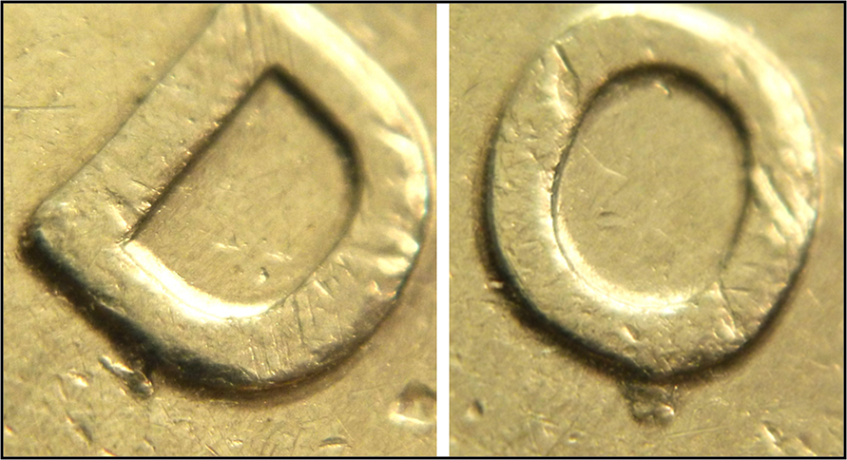 2 Dollars 1996-Éclat coin sous DO de DOllars,1,.png