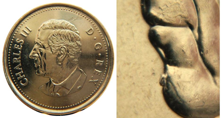25 Cents 2023-Éclat coin au menton coin fendillé-2.JPG
