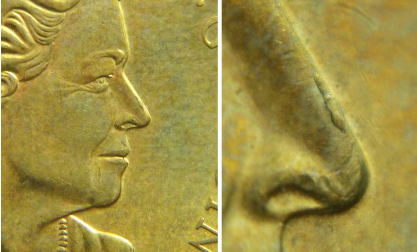 1 Dollar 2022-Éclat coin sur le nez de effigie-1.JPG