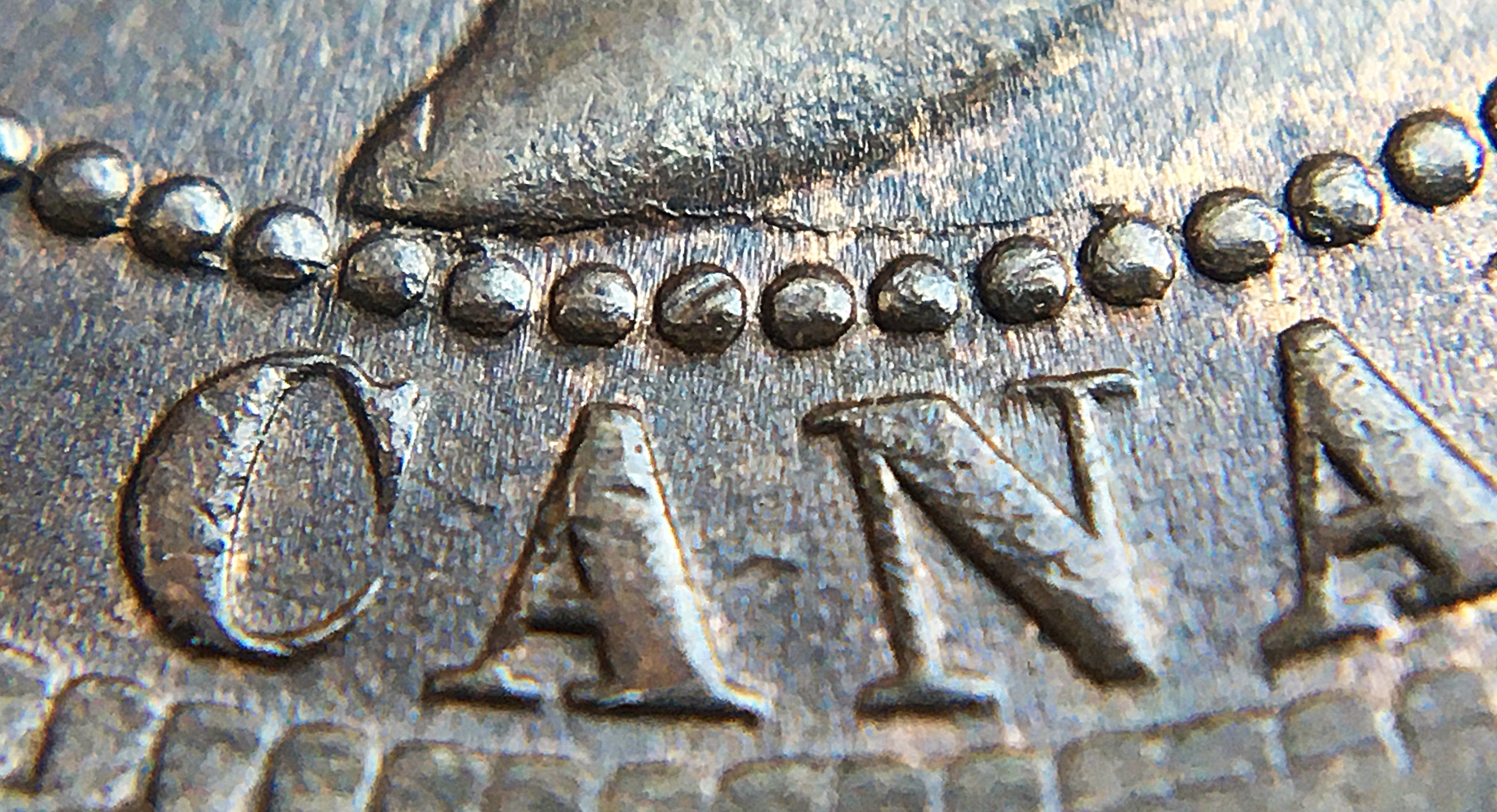1 cent 1897 fendillement base buste.JPG