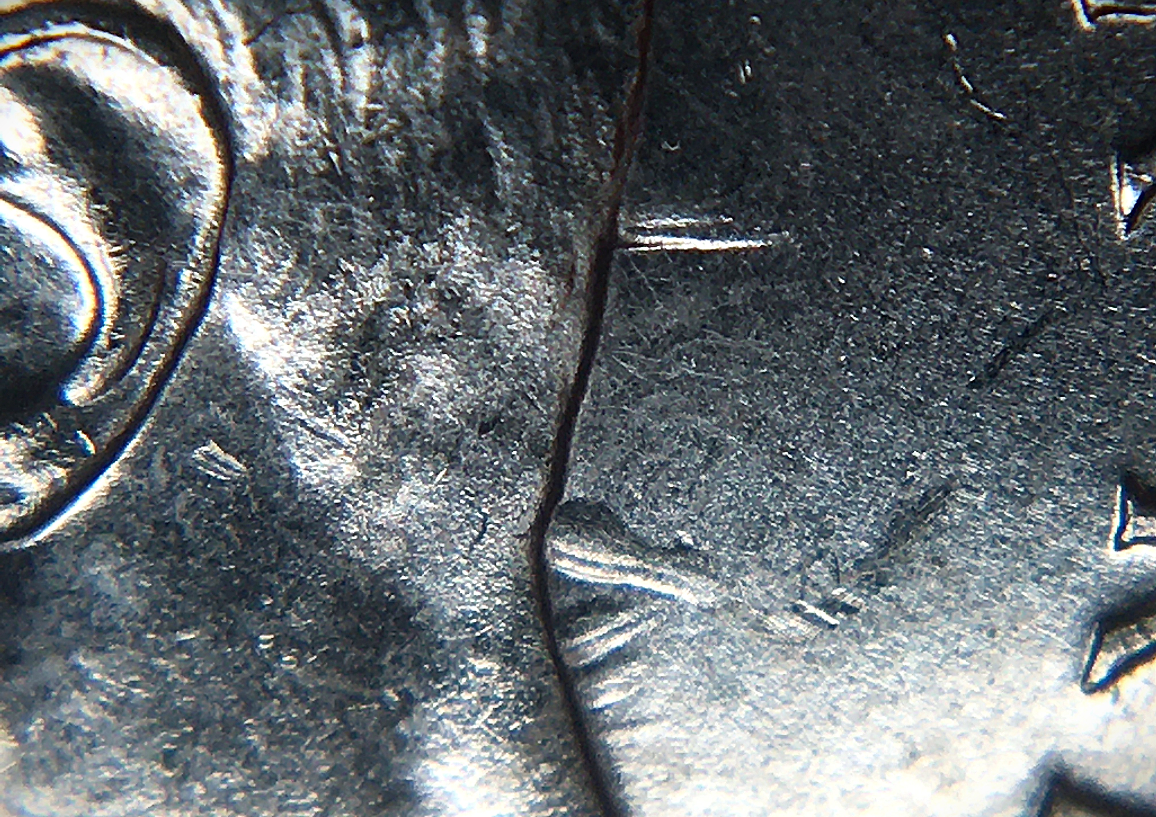 5 cents 1948 double entrechoques derrière la nuque.JPG