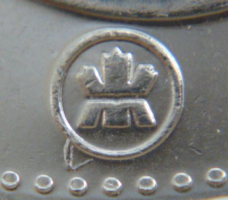 5 Cents 2012- Dommage de coin sur le logo-2.JPG