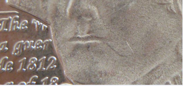 25 cents 2013 - Laura Secord-Défaut de flan près de la bouche-3.JPG