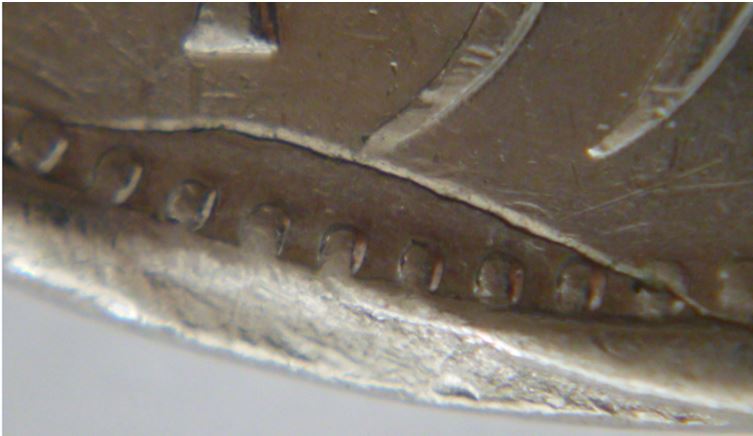 5 Cents 1974-Flans presque coupés revers-5.JPG
